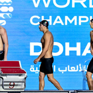 Athletes of team Italy react after winning the silver medal in the swimming 4x100m Freestyle Relay Men Final during the 21st World Aquatics Championships at the Aspire Dome in Doha (Qatar), February 11, 2024.